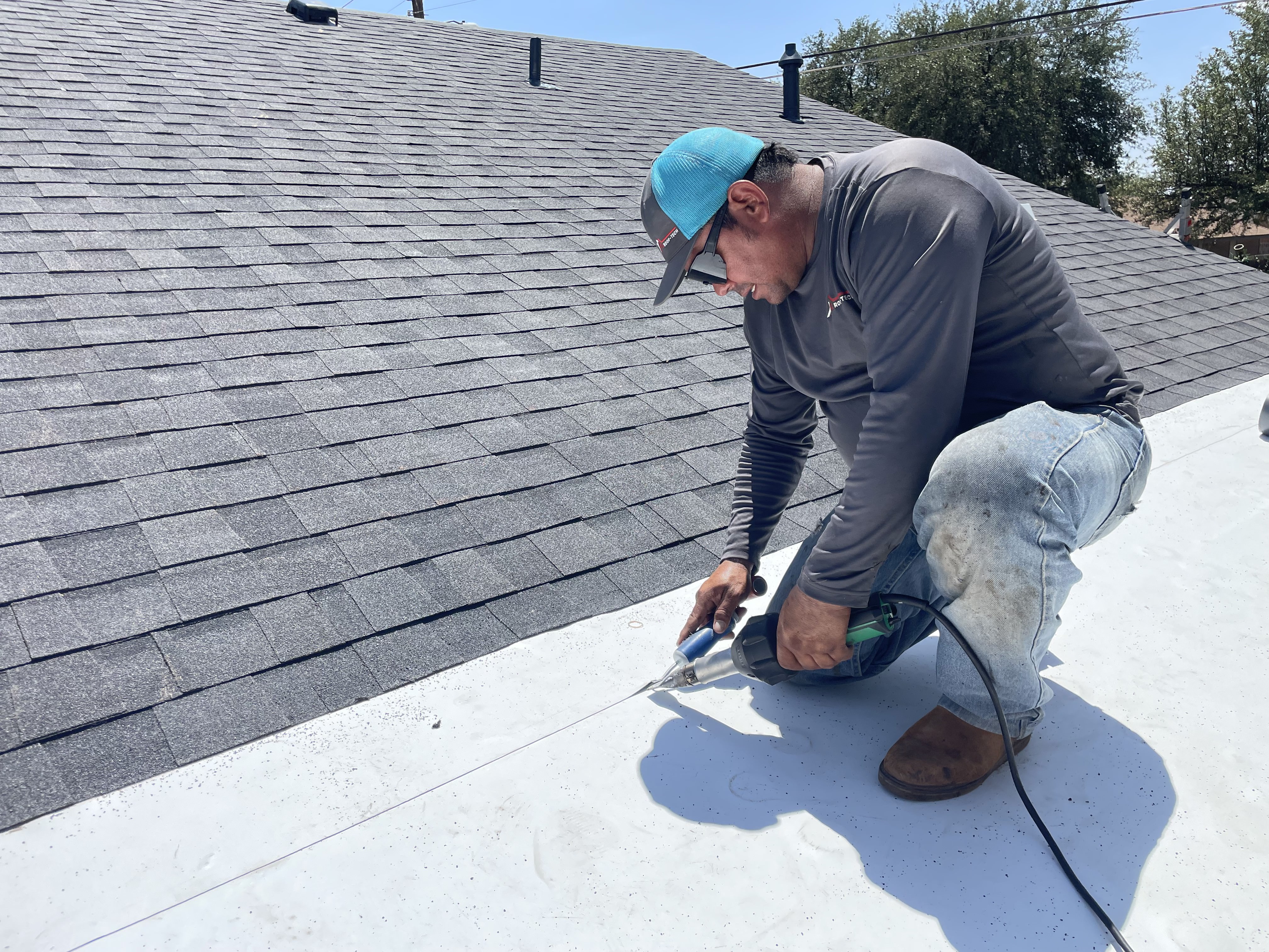 Man fixing a roof